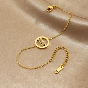 Elegant gold-plated stainless steel chain bracelet with a sparkling crystal-set round pendant