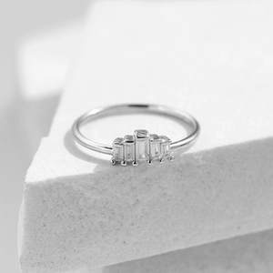 Minimalist S925 sterling silver ring featuring sparkling rectangular zircon stones on stone