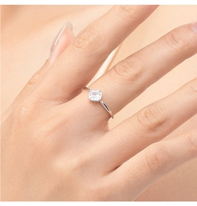 Close-up of S925 sterling silver square-cut diamond heart ring on model hand