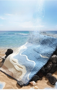 Close-up of wave pattern bathroom mat with high-density flocking on a beach setting