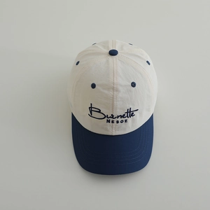 Kid's quick-dry baseball cap in color-block beige and navy with embroidered letters