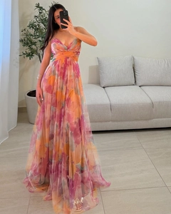 Detail of multi-color gradient mesh maxi dress featuring vibrant watercolor print and v-neckline