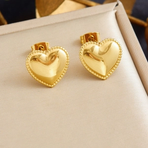 Gold plated stainless steel heart stud earrings with beaded edge on jewelry box