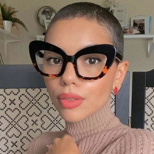 Close-up of cat-eye anti-blue light glasses with black and tortoise shell splicing frames