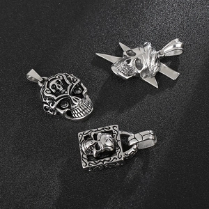 Three vintage gothic silver skull pendants in durable stainless steel for men's fashion