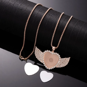 Detailed view of rose gold heart angel wing necklace with sublimation photo blanks