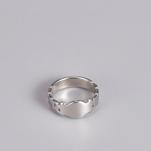 Minimalist wide silver titanium steel hollow shield ring for women shown in high detail