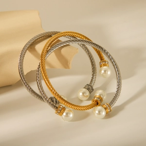 Set of twisted stainless steel cable bracelets with pearls and diamond accents