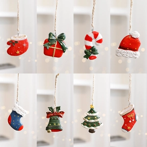Set of 8 resin Christmas tree ornaments including red stockings and gift box hanging charms