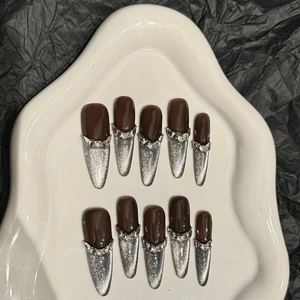 Deep brown and silver cat-eye press-on nails with luxury crown rhinestones