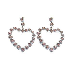 Exaggerated large hollow heart earrings with pink rhinestones for a luxury look