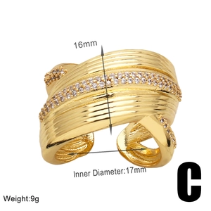 Detail view of gold zircon ring with dimensions 16mm height and 17mm inner diameter