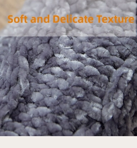 Macro detail of soft grey fleece fabric showing the thick plush texture and fuzzy fibers