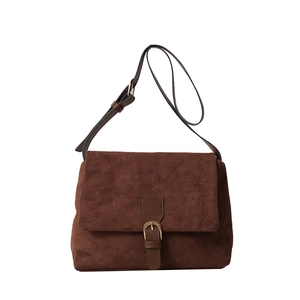 Vintage brown matte leather shoulder bag with metallic buckle and adjustable strap