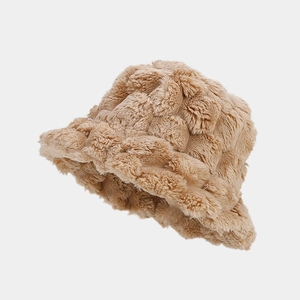 Detailed macro view of camel faux rabbit fur bucket hat with retro pineapple texture