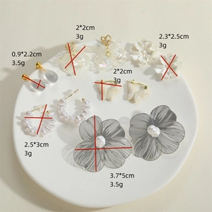 Assorted silver floral and butterfly earrings with pearls and teardrop pendants