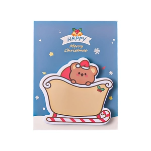 Cartoon bear on a sleigh Christmas sticky note pad for festive holiday messages