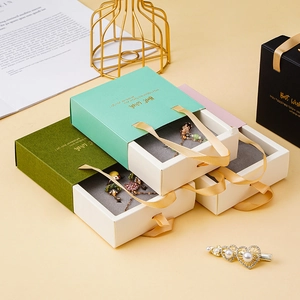 Elegant drawer-style jewelry gift boxes in multi-colors with gold satin handles
