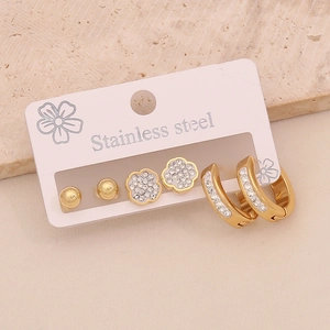 Three pairs of gold-plated stainless steel earrings with crystal flower and stud designs