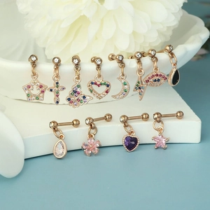 12-piece creative piercing set with zircon pendants, stars, and butterflies in rose gold