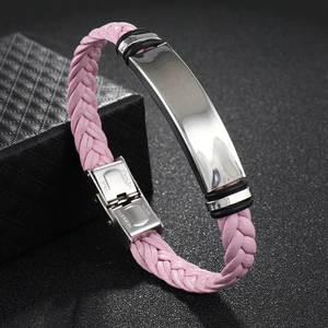 Detail of pink woven leather bracelet with polished stainless steel clasp and ID bar
