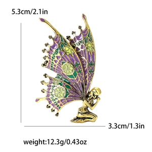 Elegant gold butterfly fairy brooch with purple and green enamel wings in 5.3cm height