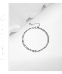 Detail of S925 silver bracelet featuring emerald cut zircon on wavy artistic background