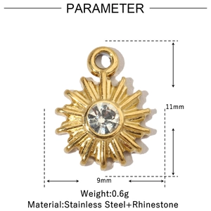 Detail view of 11mm gold stainless steel sunburst charm with inlaid sparkling rhinestone