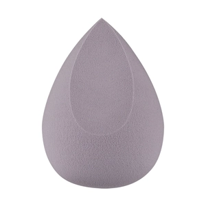Detailed macro view of gray-purple makeup sponge with teardrop shape and slanted cut
