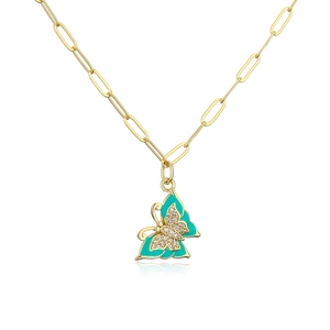Detailed shot of 18K gold-plated necklace with turquoise butterfly pendant and crystals