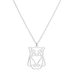 Macro detail of geometric hollow owl pendant necklace in polished silver stainless steel