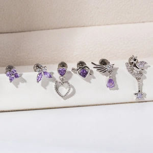 Set of 6 titanium steel ear studs featuring purple zircon hearts and butterfly designs