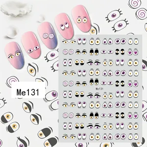 Macro detail of cartoon eye nail stickers showing diverse styles on pink nails