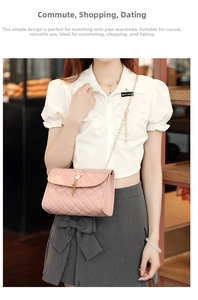 Detailed view of pink quilted handbag with gold chain strap and decorative tassel