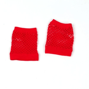 Macro detail of red fishnet fingerless gloves showing elastic mesh texture and ring loop