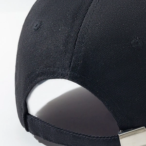 Rear view of black twill baseball cap showing adjustable strap and silver metal buckle