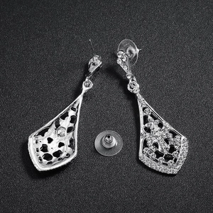 Vintage teardrop rhinestone earrings for weddings featuring intricate honeycomb hollow backing