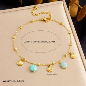 Gold shell starfish anklet with blue stone pendant including size and weight specs