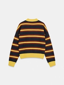 Flat lay of vintage striped knit sweater with retro navy, yellow and red color block design