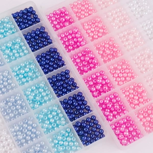 Two boxes of 6mm ABS gradient faux pearls for DIY jewelry making in blue and pink tones