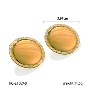 Detailed view of 3.91cm 18K gold-plated earrings with pave-set crystals around edges