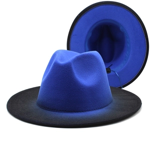 Detailed side view of felt fedora hat featuring royal blue to black gradient brim