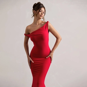 Detail of red off-shoulder twist fishtail dress with elegant silhouette and draping fabric