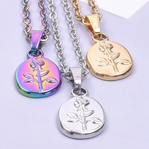 Close-up of embossed rose pendants in rainbow, silver, and gold vacuum plating