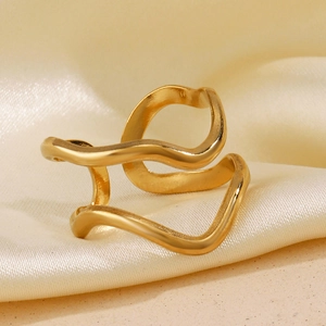 Minimalist wave double layer open ring in gold finish on elegant silk fabric background