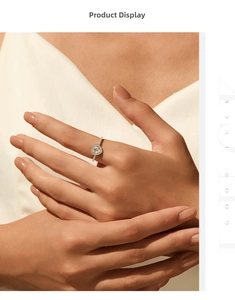 Close-up of heart-shaped diamond ring with halo setting on a model finger