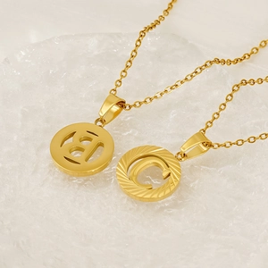 Modern 18K gold plated stainless steel initial necklace with round cutout pendants