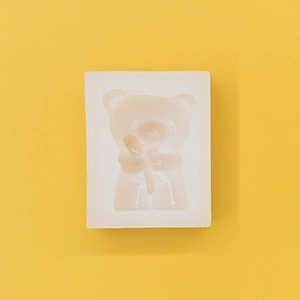 White silicone mold for teddy bear scented candles and flower soaps with 3D design