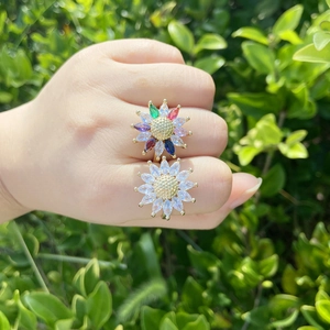 Detail of sunflower ring featuring colorful marquise-cut zircons and 18K gold plating