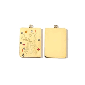 Detail of double-sided 14K gold Aries pendant with vibrant crystals and smooth back
